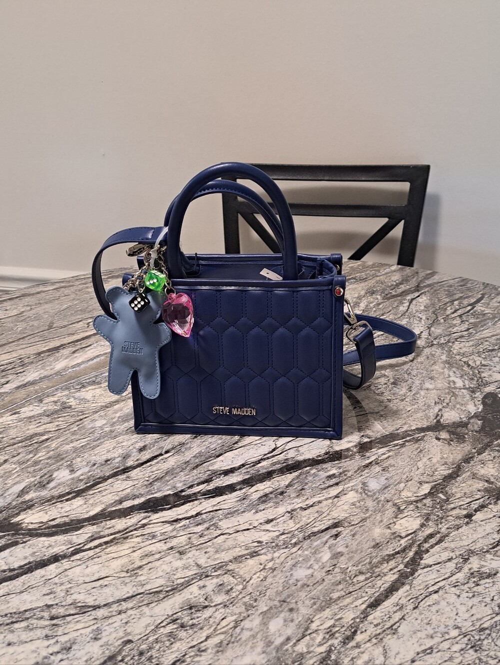 Steve Madden Navy Binko Quilted Satchel with Bag Charms & Cross.\nBody Strap